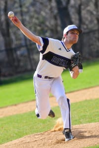Port Jefferson pitcher Benjamin Kluender, who threw all seven regular innings, hurls the ball from the mound in the Royals’ first loss of the season, an extra-inning 6-5 loss to Southold at home, Monday. Photo by Bill Landon