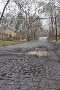 Part of Pleasant Drive in East Setauket needs to be repaired as of Tuesday. Photo by Elana Glowatz