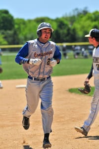 Comsewogue’s Rob Dattoma runs the bases after his home run in the top of the third inning, in the Warriors’ 6-5 loss to Bayport-Blue Point on May 23, which forces a game three in the Class A playoffs. Photo by Bill Landon