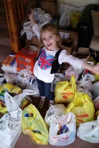 Through the Kaylee Cares Spring Food Drive, Kaylee Corrar helped feed nearly 70 families in the Middle Country community. Photo from Katie Corrar