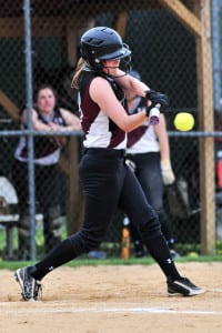 Kings Park outfielder Kristen Plant makes contact in the Kingsmen’s 6-3 loss to Longwood in the first round of the Class AA playoffs on May 18. Photo by Bill Landon