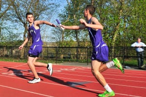 Port Jefferson’s James Concepcion receives the handoff from Parker Schoch in a relay event during the Royals’ 81-60 win over Stony Brook Monday, May 4. Photo by Bill Landon
