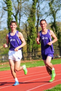 Port Jefferson’s Justin Julich and Parker Schoch race around the track in the Royals’ 81-60 win over Stony Brook Monday, May 4. Photo by Bill Landon