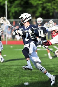 Smithtown West’s Garrett Brunsvold winds up to shoot in his team’s 17-11 Division I semifinals playoff loss to Smithtown East on May 22. Photo by Bill Landon