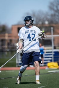 Tim Mattiace plays lacrosse in his Blue Devils uniform this past season. Photo by Darin Reed