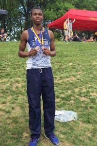 Huntington's Kyree Johnson poses with his medals. Photo from Huntington athletics