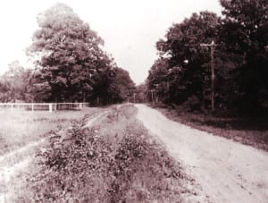 The view of Middle Country Road near New Village Congregational Church in the early 1900s. Photo from Middle Country Public Library Heritage Collection