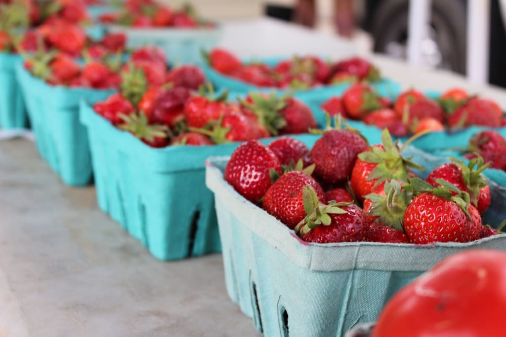 Fresh strawberries are on display at the Northport Farmers’ Market last year. Photo by Victoria Espinoza