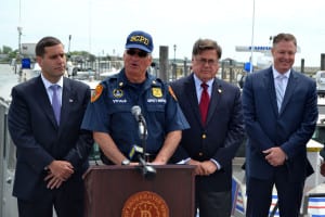 From left, Assistant Deputy County Executive Tim Sini; Police Marine Bureau Deputy Inspector Ed Vitale; Brookhaven Supervisor Ed Romaine; and Brookhaven Councilman Neil Foley at a press conference on boating safety. Photo by Alex Petroski