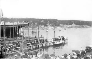 Spectators fill the dock to watch the Martha E. Wallace launch, taken by John M. Brown. Photo from the Port Jefferson Village archive