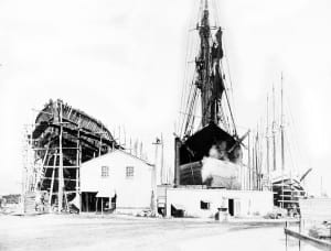 The Martha E. Wallace, under construction, sits at the Mather and Wood Shipyard with the Ida C. Southard, which is getting repairs. Photo from the Port Jefferson Village archive