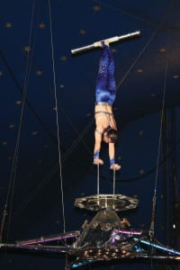 German Fassio balances high above the ground. Photo from Cole Bros.