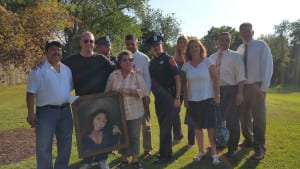 Friends, family and town officials gather to remember Maggie Rosales, Danny Carbajal and Sarah Strobel in Huntington Station on Thursday. Three trees were planted in their honor. Photo by Mary Beth Steenson Kraese