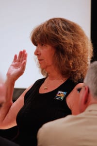 Lynn Capobianco takes her oath of office. Photo by Erika Karp