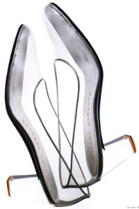 The ‘Cinderella’ shoe, 1961, clear vinyl with lucite heel, silver kidshin details and lining by Beth Levine from the collection of Helene Verin. Image from the LIM