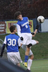 Comsewogue's Jake Muller heads the ball. File photo by Desirée Keegan