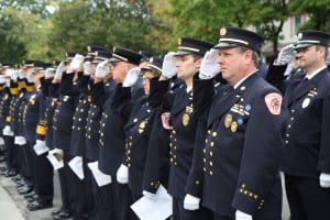 Members of the East Northport Fire Department participate in the annual 9/11 memorial service on Friday, Sept. 11, 2015. Photo by Victoria Espinoza