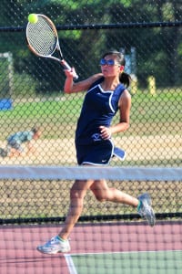 Northport’s Lucy Jiang sends back a forehand shot. Photo by Bill Landon