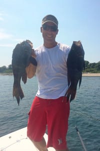 Angler Craig Scail with a fine brace of local, Long Island Sound black sea bass. Photo from Angelo Peluso