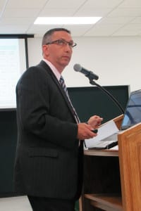 Kevin Scanlon, assistant superintendent for educational services, delivers a presentation. Photo by Andrea Moore Paldy
