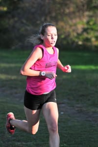 Samantha Plunkett runs for Middle Country. Photo by Bill Landon