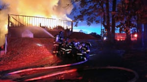 Firefighters battle the blaze at the Stonebridge Country Club. Photo by Jeff Bressler