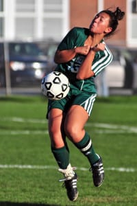 Ward Melville senior forward and co-captain Ciara Guglielmo stops the ball to gain possession at midfield in the Patriots' 6-0 blanking of Brentwood on Oct. 5. Photo by Bill Landon