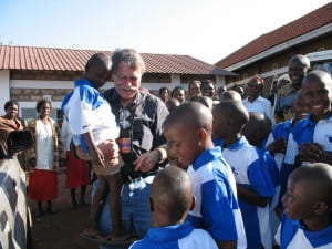 Larry Hohler interacts with children in Meru, Kenya. File photo
