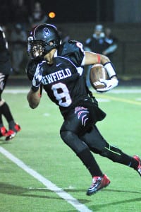 Newfield senior wide receiver Elijah Riley goes the distance for the touchdown, one of his three in the game, to help the Wolverines outscoer Deer Park 54-6 in the qualifying round of the Division II playoffs on Nov. 6. Photo by Bill Landon