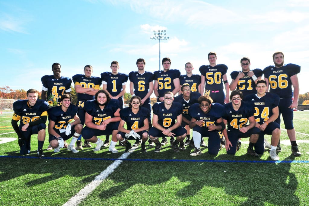 The seniors of the Shoreham-Wading River football team pose for a photo after their second consecutive undefeated season. Photo by Bill Landon