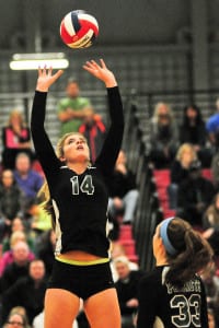 Ward Melville junior Cierra Low sets the ball in the team's 3-0 loss to Connetquot in the Suffolk County Class AA finals on Nov. 12. Photo by Bill Landon