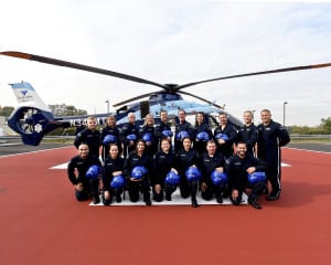 The SkyHealth team poses for a photo on the hospital’s new helipad established this past summer. Photo from Huntington Hospital