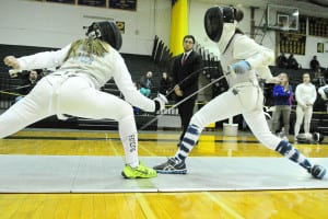 Ward Melville junior Lara Obedin fences against a Huntington opponent in a match last season. File photo by Bill Landon