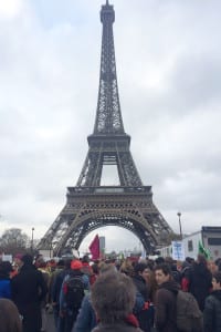 The Eiffel Tower is surrounded by protesters at the United Nations Climate Change Conference in Paris. Photo by Emma Collin