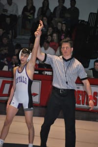 Vinny Miceli has his arm raised after winning his first Suffolk County title. File photo by Deb Ferry 