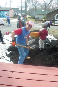 Ed DiNunzio digs deep to beautify a camp for kids with disabilities. File photo by Dennis Brennan