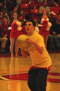 Ethan Agro lines up to take his three-point shot during halftime of the Stony Brook University men's basketball game on Jan. 9. Photo from SBU
