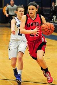 Newfield’s Maria Daume races to the basket. Photo by Bill Landon