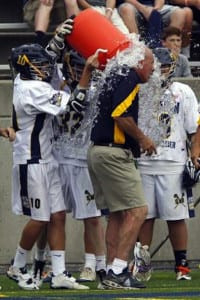 Tom Rotanz gets water dumped on his head by a former Shoreham-Wading River team after a win. Photo from Tom Rotanz
