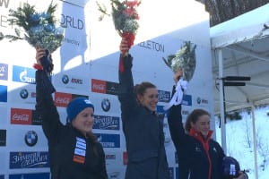 Port Jefferson Station's Annie O'Shea, center, claimed a first-place finish behind Marina Gilardoni from Switzerland, left, and Laura Deas from Great Britain, right, in the World Cup skeleton race in Lake Placid, NY. Photo from Amanda Bird