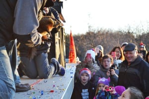 Holtsville Hal is presented to a group of young onlookers on Groundhog Day. Photo by Alex Petroski