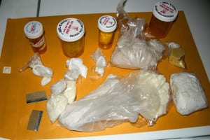 Police say they seized drugs and cash from a Coram home last week. Photo from SCPD