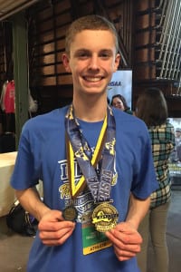 Daniel Claxton is all smiles with his state champion medals. Photo from Daniel Claxton