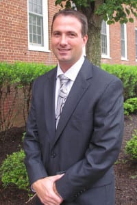 Harborfields High School Principal Rory Manning smiles. File photo