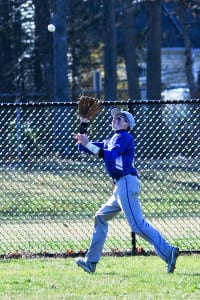 Jake Sardinia makes a grab in the outfield for Comsewogue. Photo by Bill Landon