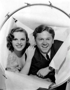 Judy Garland hangs with Mickey Rooney in a scene from ‘Strike Up the Band.’ Photo from the WMHO