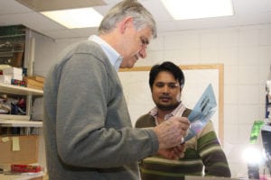 Bruce Stillman with Manzar Hossain, a graduate student. Photo from CSHL