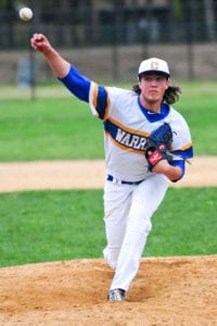 Mike Stiles fires a pitch from the mound for Comsewogue. Photo by Bill Landon