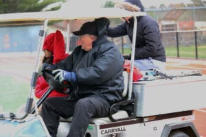 Lasinski drives his golf cart around the grounds at Harborfields. Photo from Hansen Lee