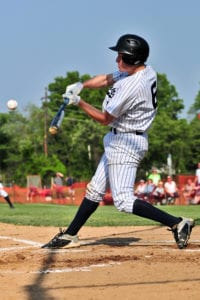 Second baseman George Sutherland drives in a run. Photo by Bill Landon